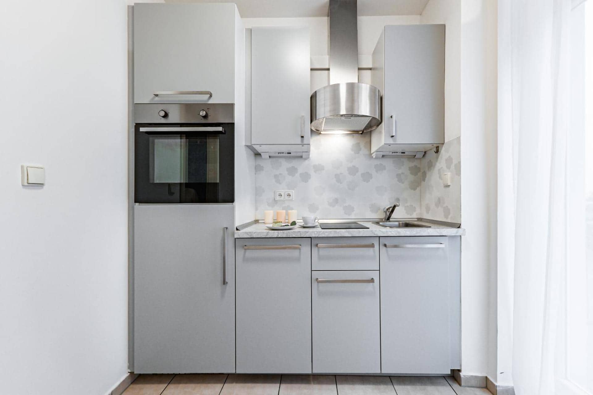 Karlsbad Apartments, Karlovy Vary — kuchyňský kout
