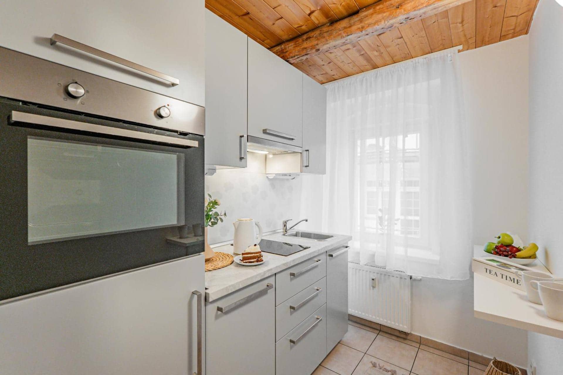 Karlsbad Apartments, Karlovy Vary — kuchyňský kout